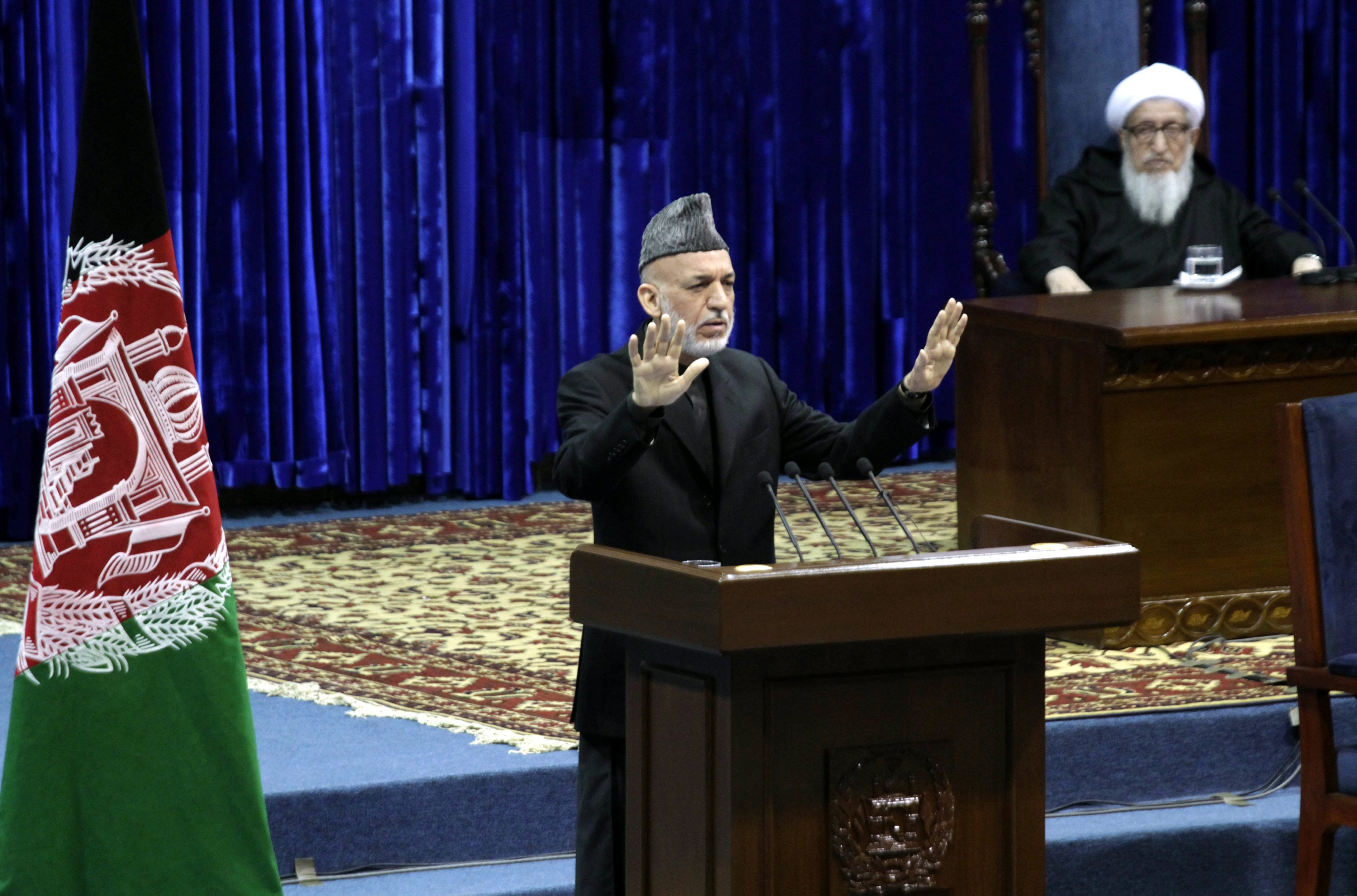 Afghan President Hamid Karzai speaking to the Loya Jirga on Thursday. Photo: EPA
