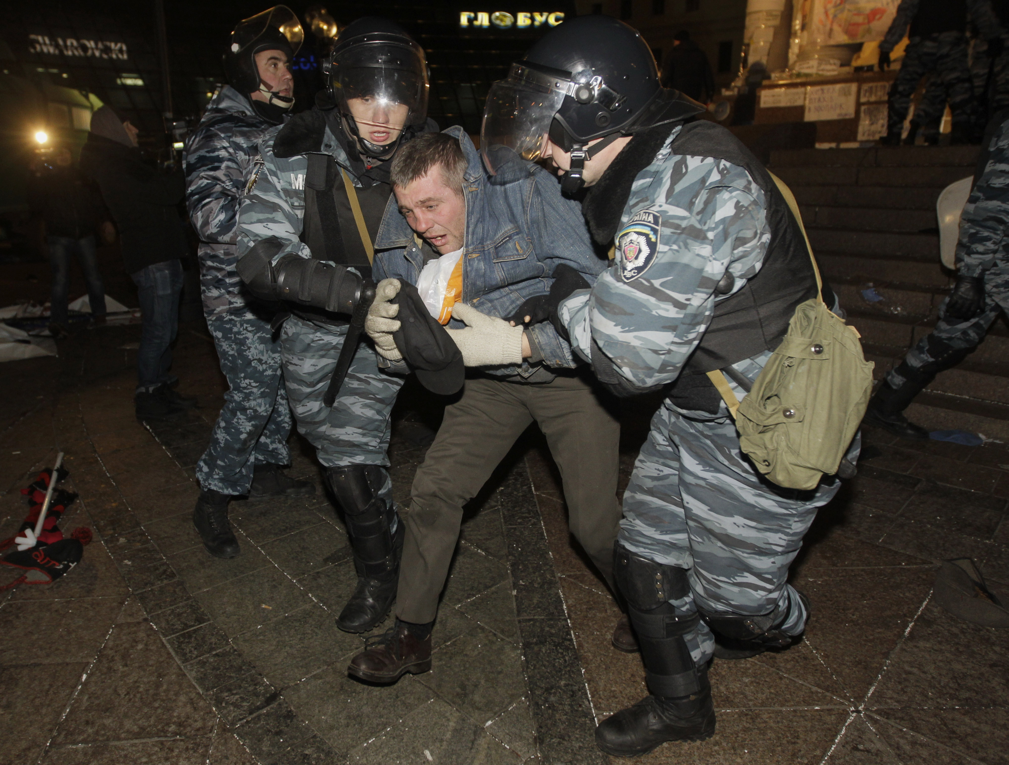 Ukrainian police detain an activist at Independence Square in Kiev on Saturday. Photo: AP