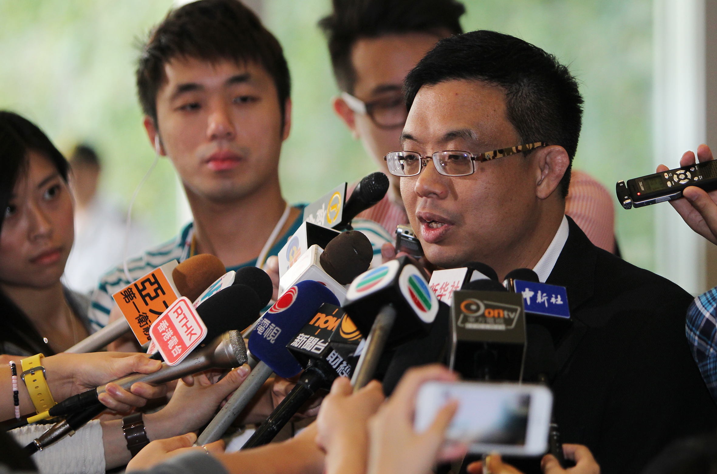 Legislator James To Kun-sun talks to media at the Central Government Offices in Tamar. Photo: Nora Tam