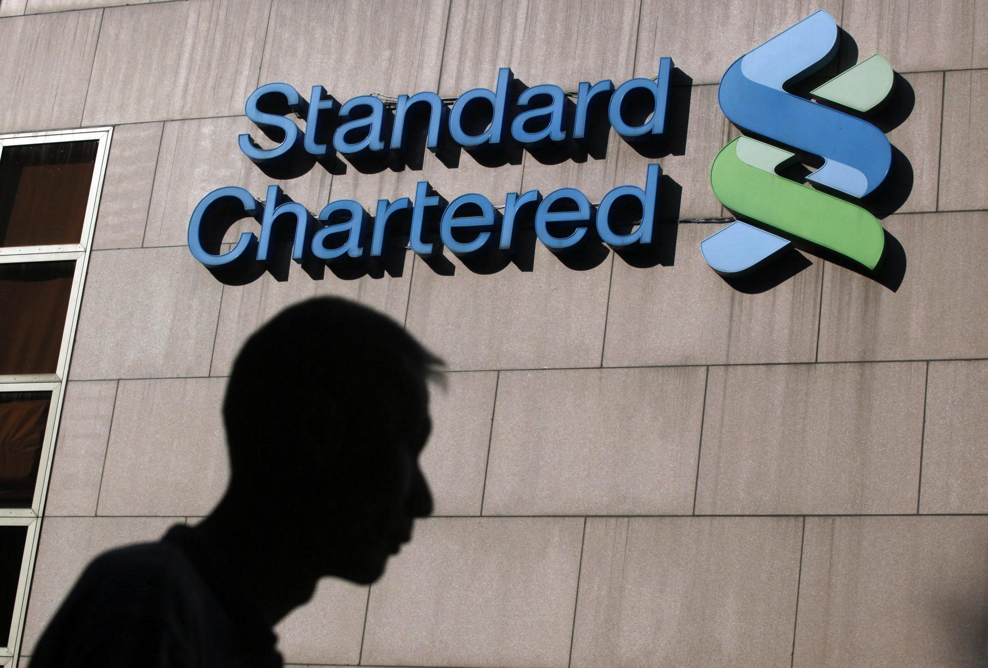 Management at Standard Chartered is keeping up a positive outlook, but some analysts have doubts the Asia-focused lender can get growth back on track. Photo: AP