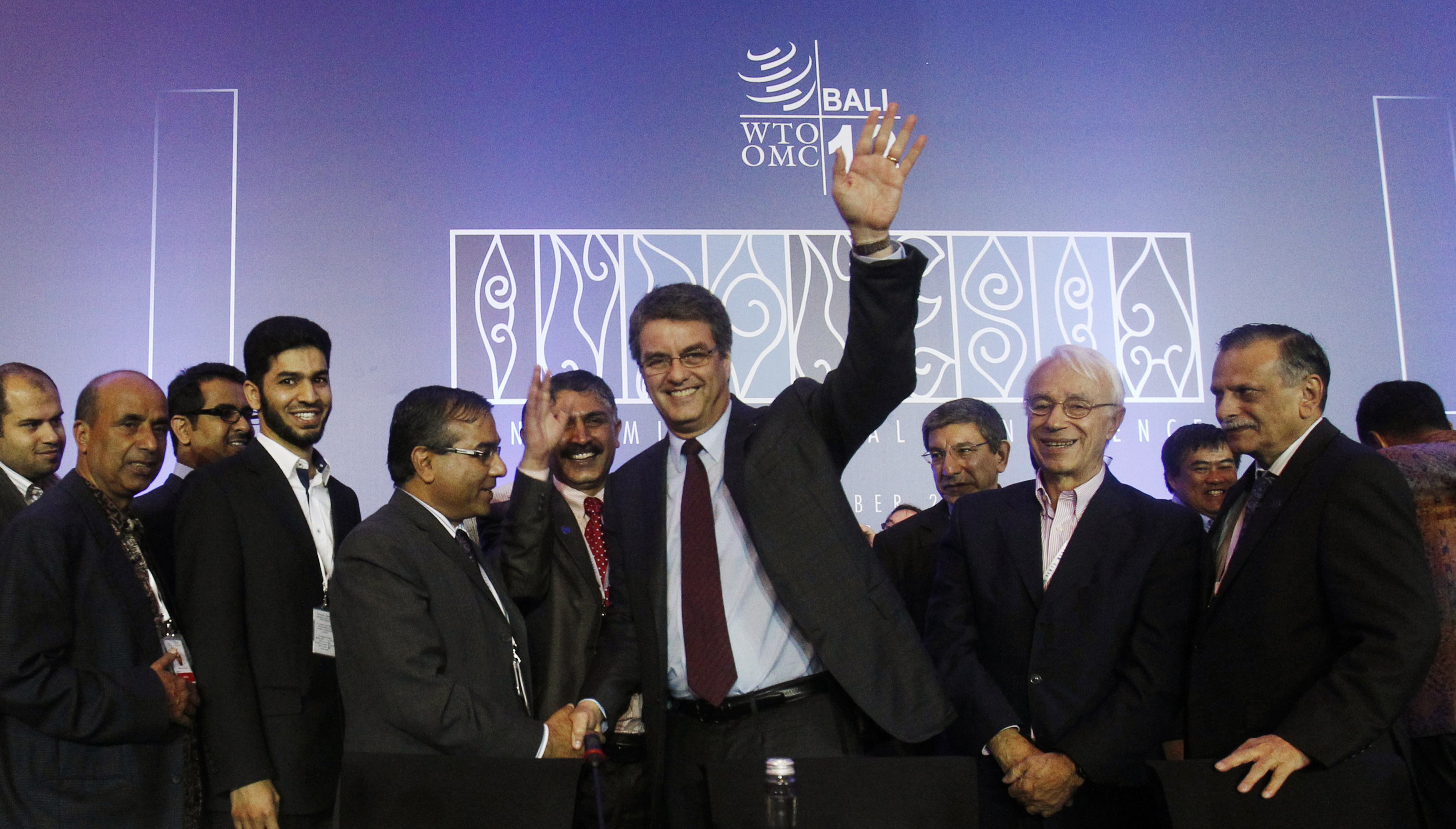 Director-General Azevedo gestures as he is congratulated by delegates after the closing ceremony of the ninth WTO Ministerial Conference in Nusa Dua. Photo: Reuters