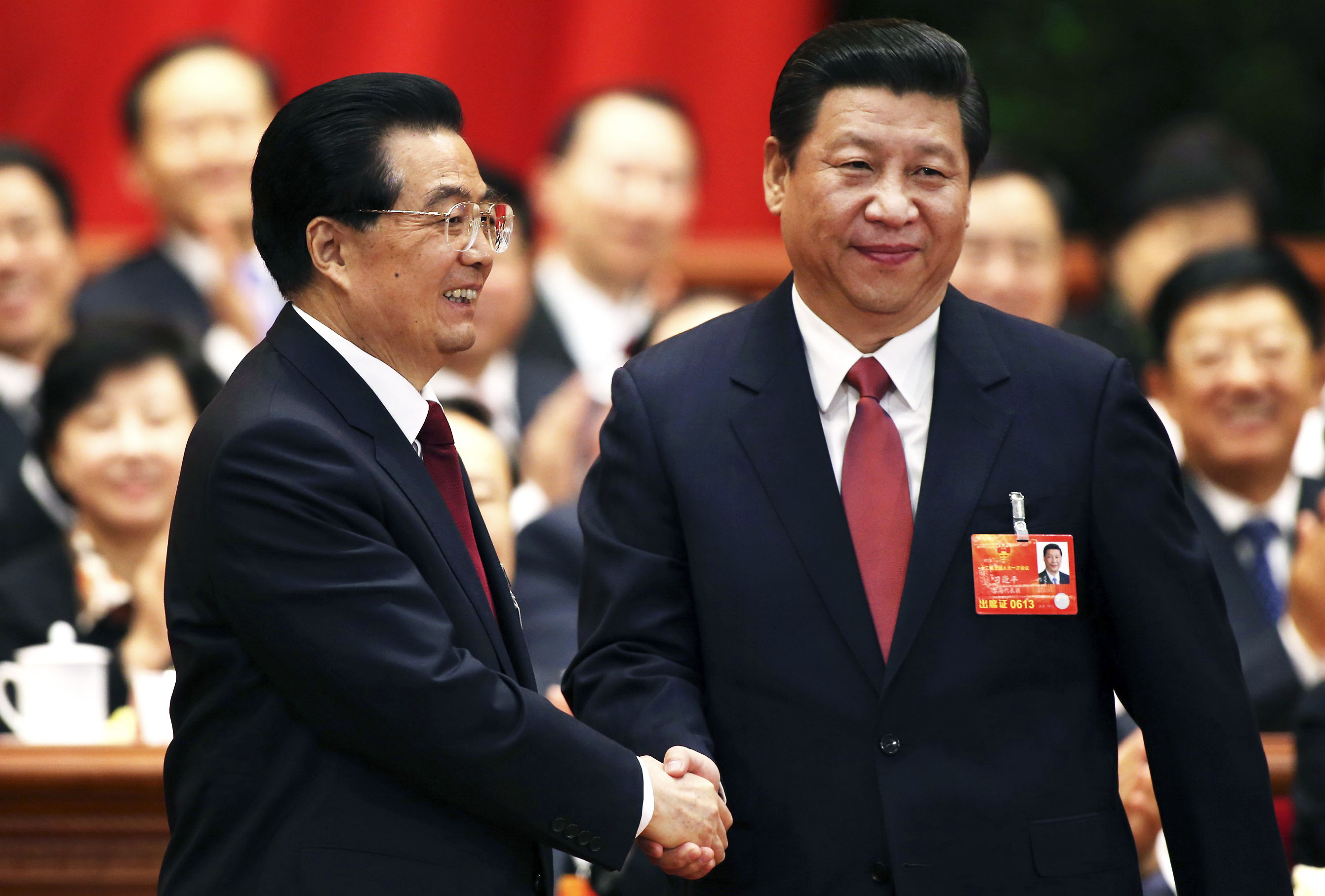 Analysts have said Xi Jinping's (right) roles as head of economic reform and national security groups would give him more power than his predecessor Hu Jintao (left) but liberal party elders say this could prove a double-edged sword. Photo: Reuters
