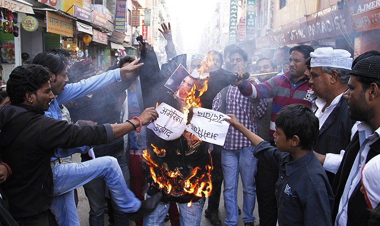 Indian Muslims burn an effigy of US President Barack Obama as they protest against the alleged mistreatment of New York based Indian diplomat Devyani Khobragade, in Ajmer, India, on Thursday. Photo: AP