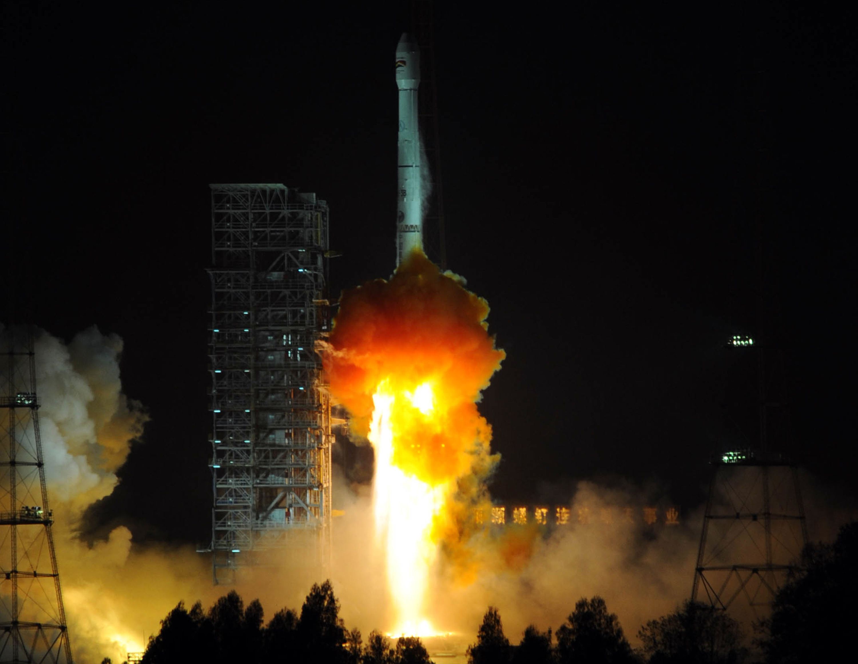 A Chinese Long March-3B carrier rocket blasts off with Bolivia's first telecommunications satellite on Saturday. Photo: AFP