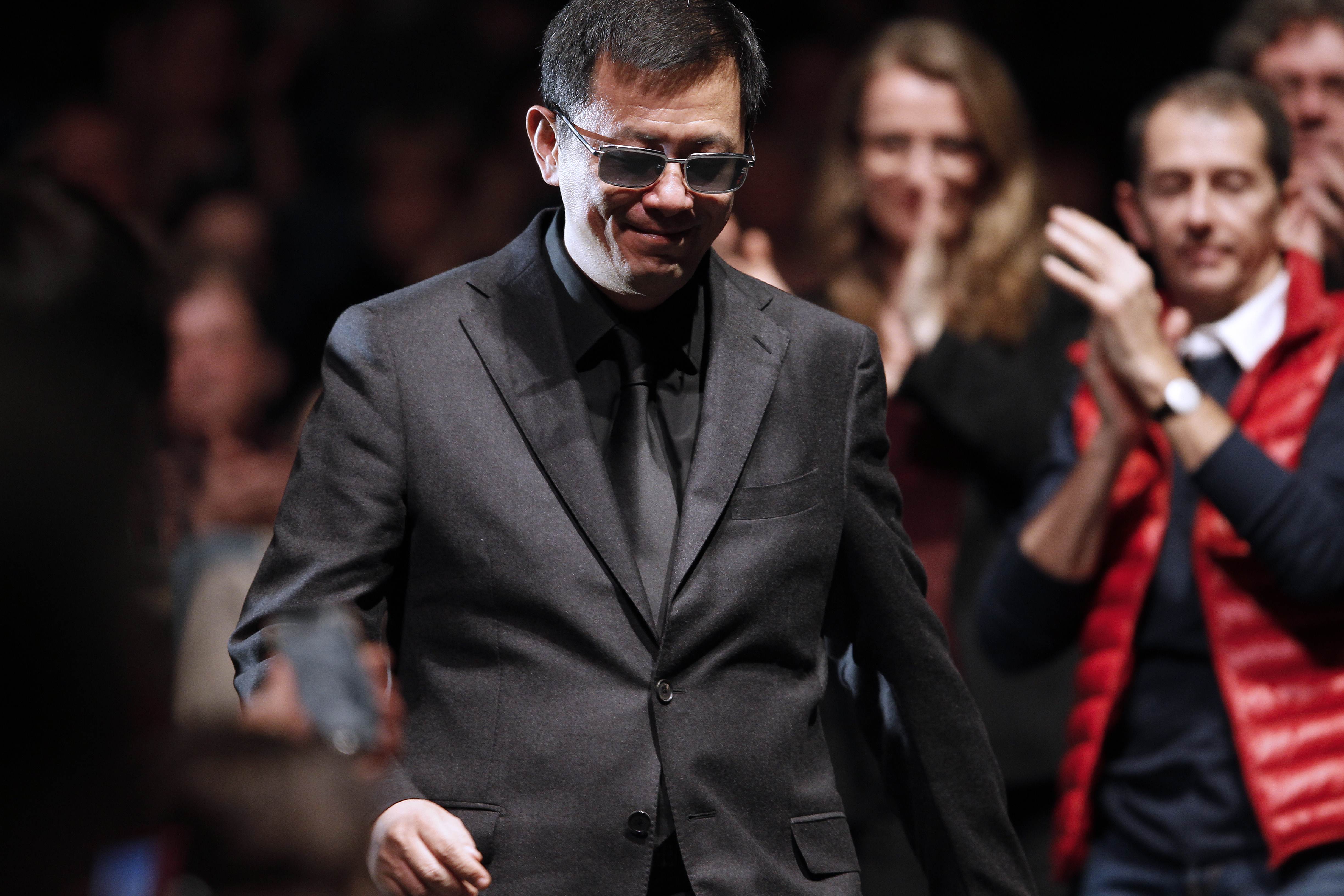 Wong Kar-Wai arrives on March 8, 2013 to receive a tribute price during the 15th edition of the Asian Film Festival in Deauville, France. Photo: AFP 