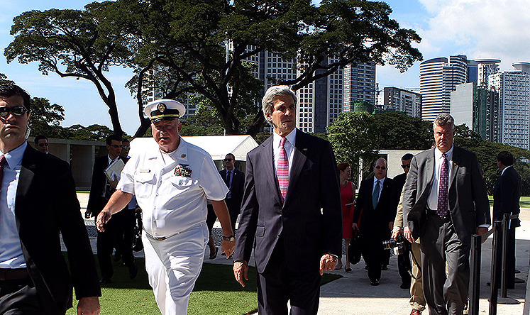 US Secretary of State John Kerry arrives for a wreath-laying ceremony at the Manila American Cemetery and Memorial in Manila. Photo: AFP
