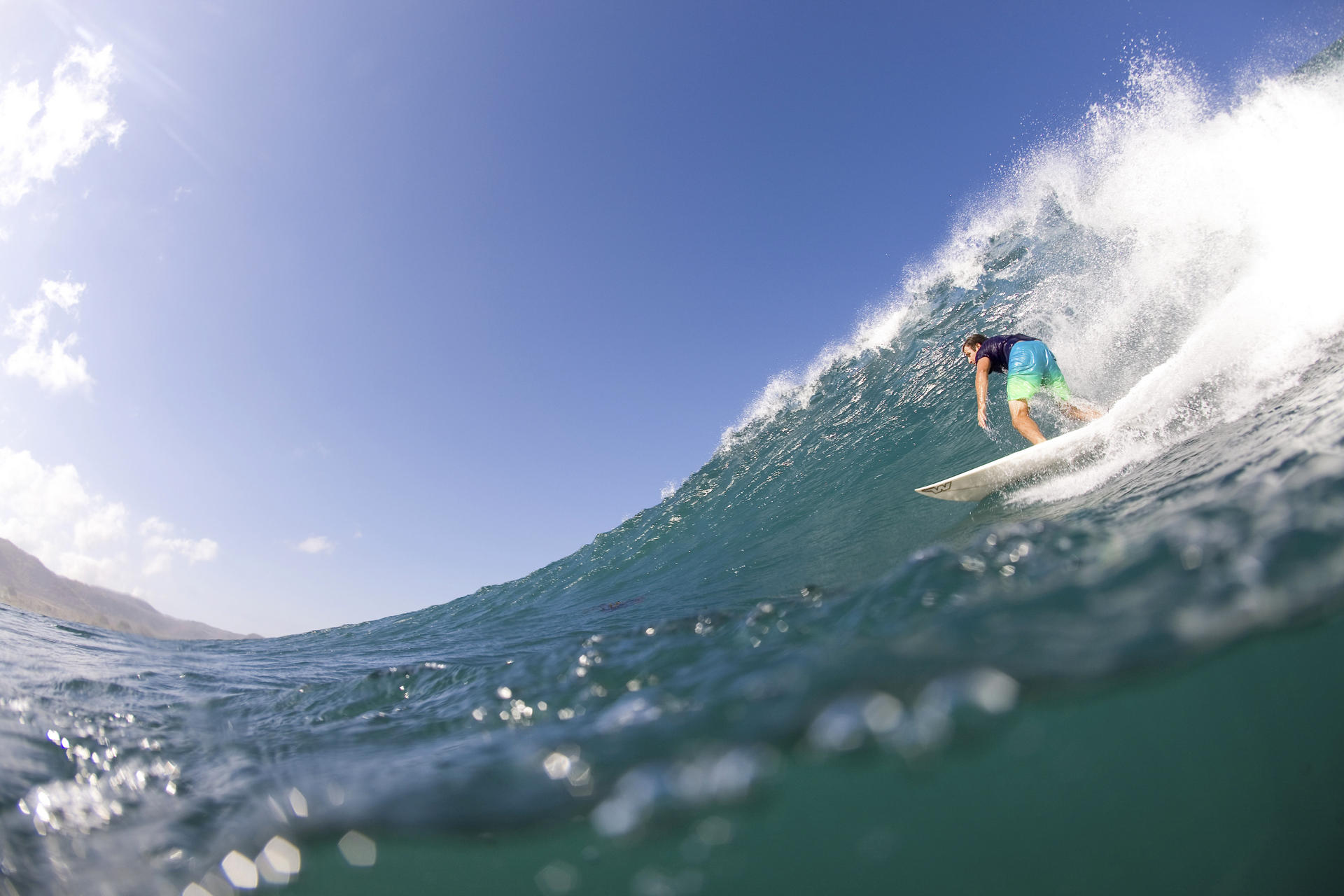 Pumping surf and empty beaches are part of the island's charm. Photos: Alamy, Holly McDonald