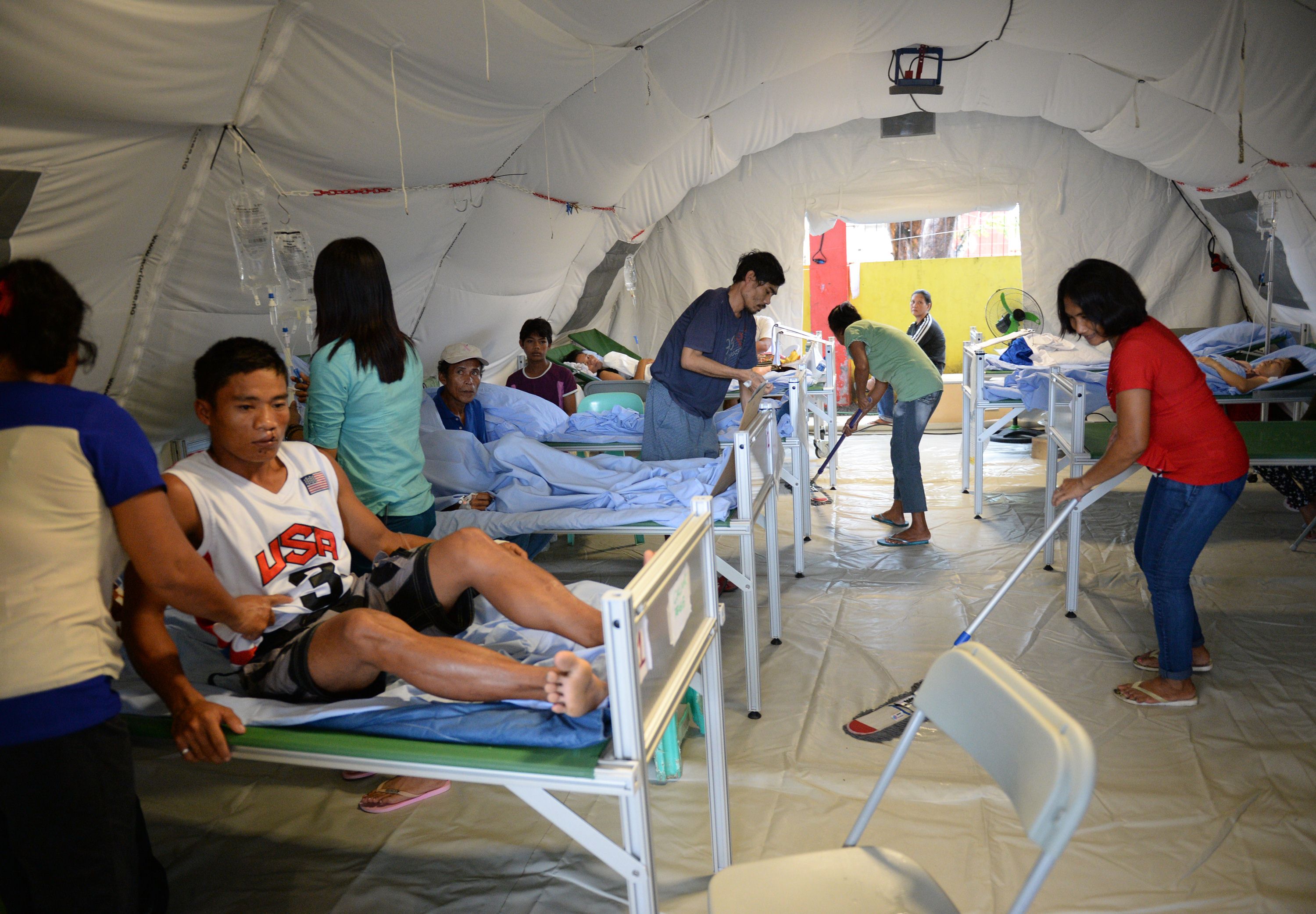 Patients inside one of the ward-tents of the Red Cross tent hospital in Basey town, central Philippines. Photo: AFP