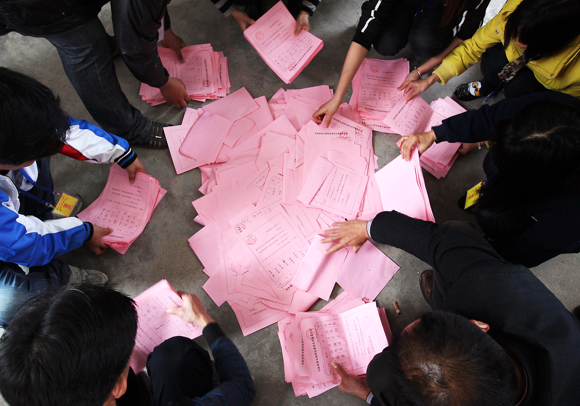 Ballots lie on the floor after the village committee election in March 2012 in Wukan. Photo: Felix Wong