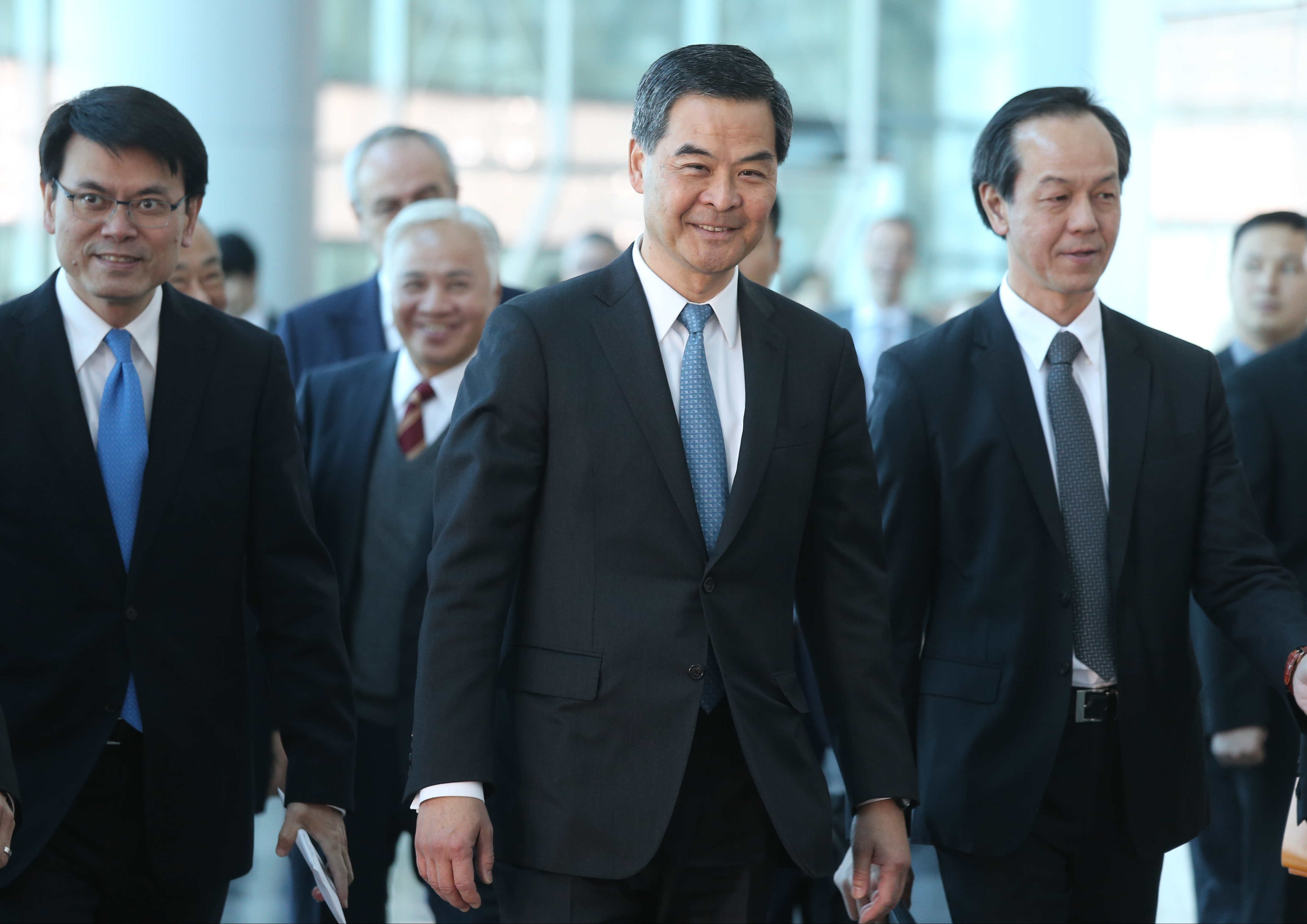 Chief Executive Leung Chun-ying meets business leaders accompanied by Edward Yau Tang-wah (left), director of the Chief Executive's Office. Photo: K.Y. Cheng