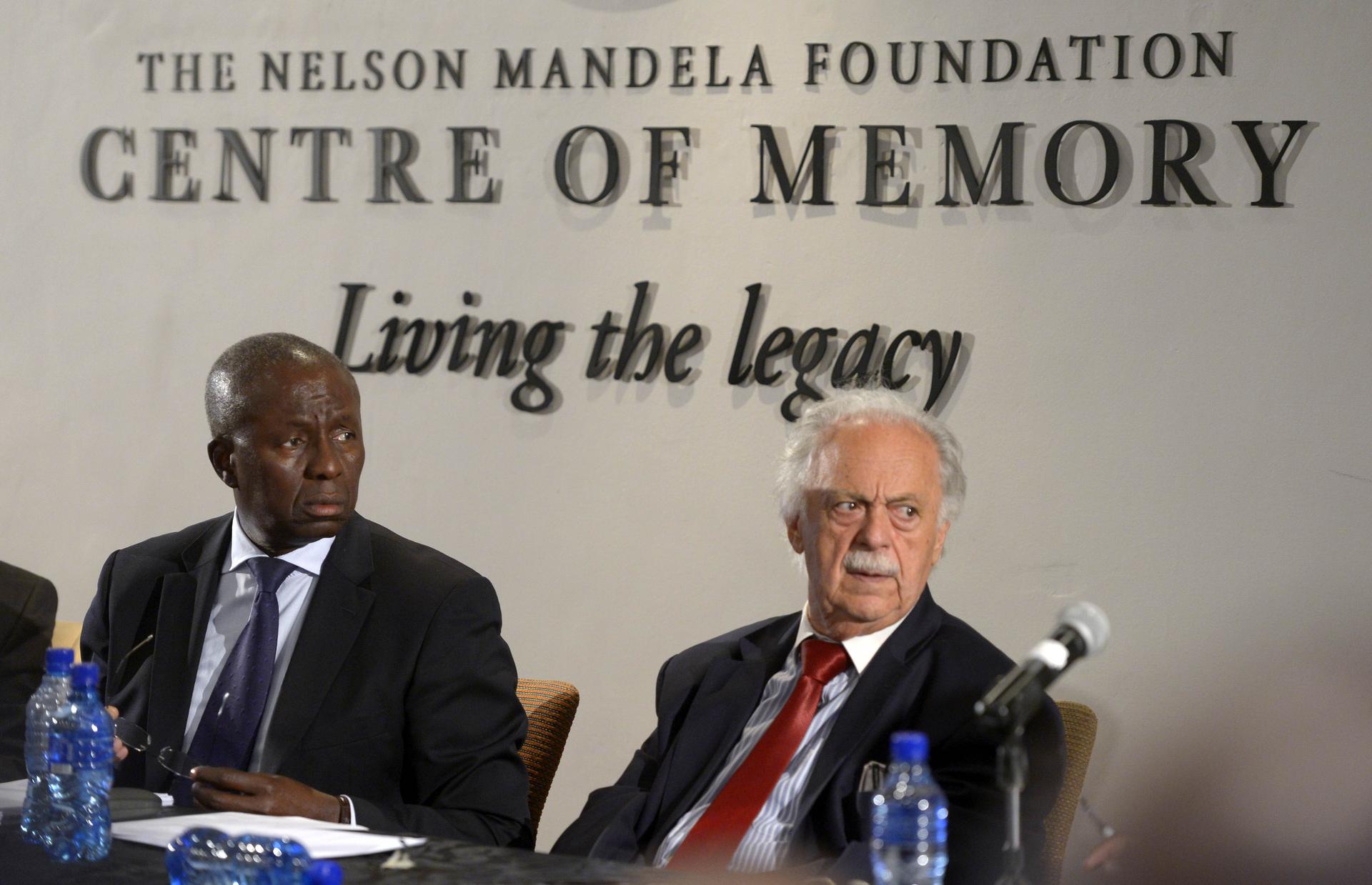 Dikgang Moseneke (left) and George Bizos, two of the three executors of Nelson Mandela's will. Photo: AFP