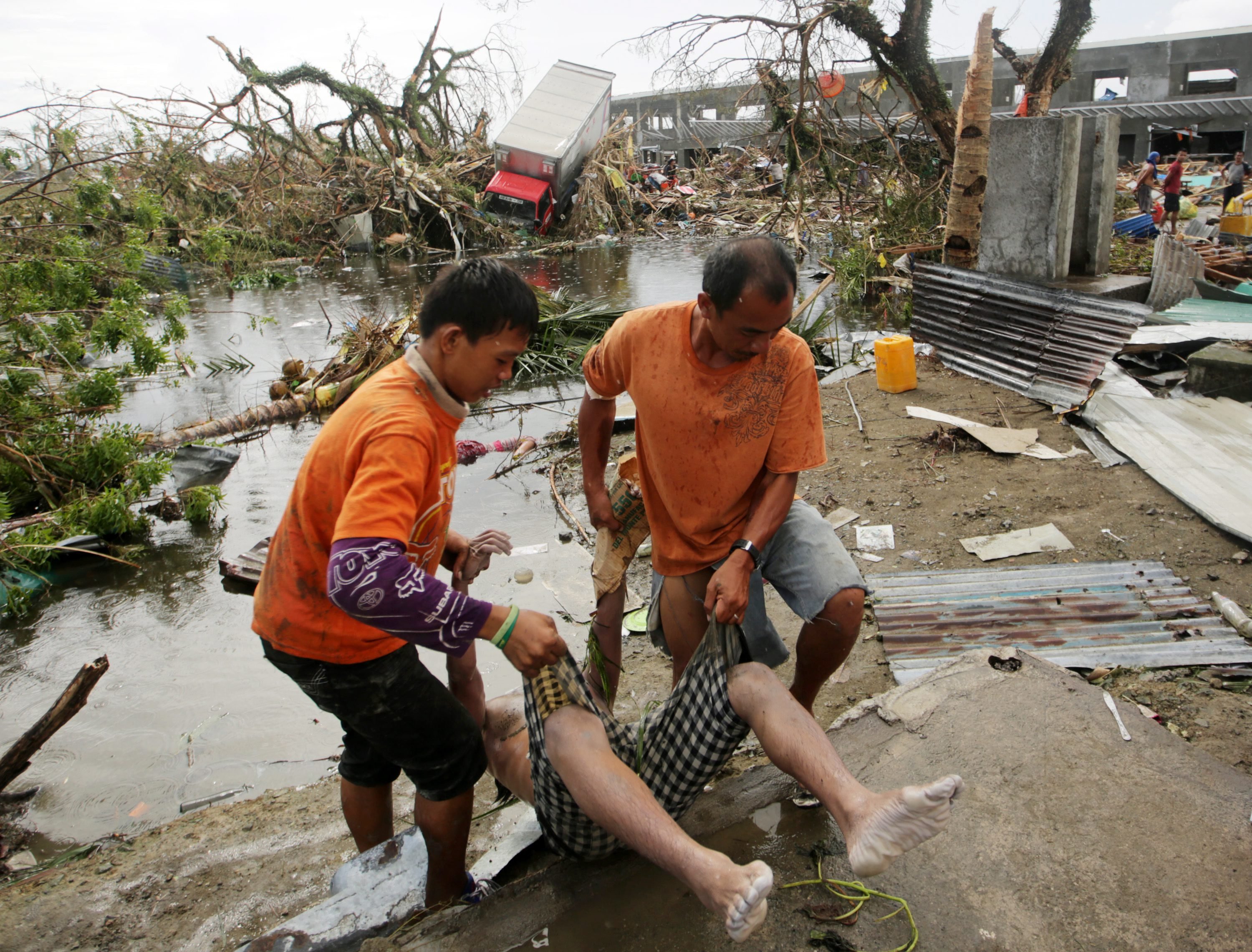 More than 100 died and nearly 800,000 were displaced when Typhoon Haiyan devastated the Philippines last November. Photo: EPA