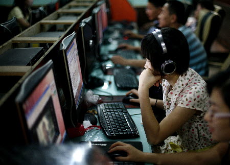 Customers at an internet cafe in Beijing - a city with the mainland's second fastest internet connection. Photo: AP
