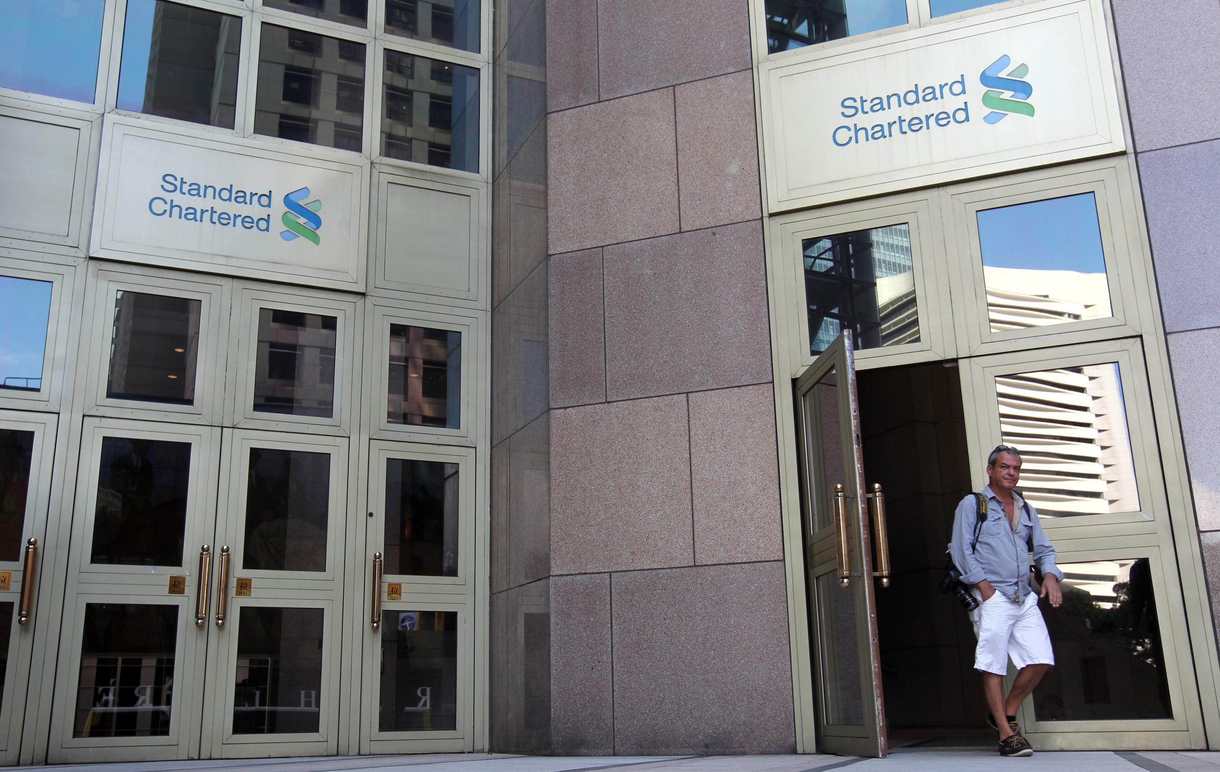 Standard Chartered appears to be divesting its consumer finance businesses in Hong Kong and South Korea. Photo: Dickson Lee