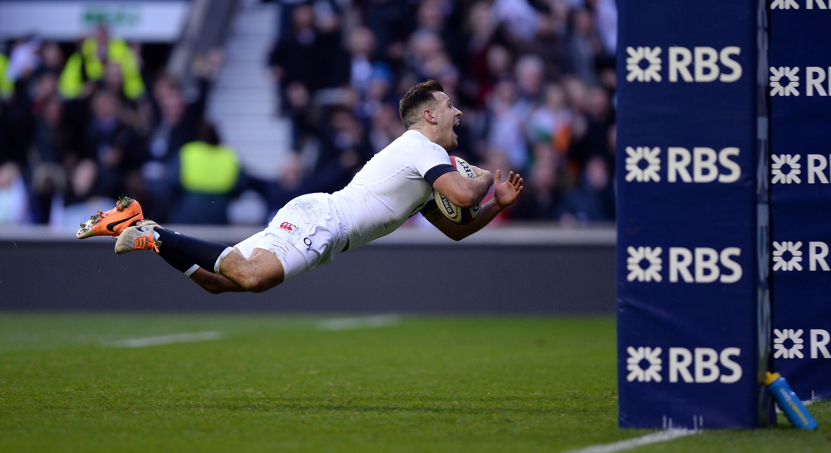 England's Danny Care dives in to score against Ireland in their Six Nations clash at Twickenham on Saturday. Photo: AP