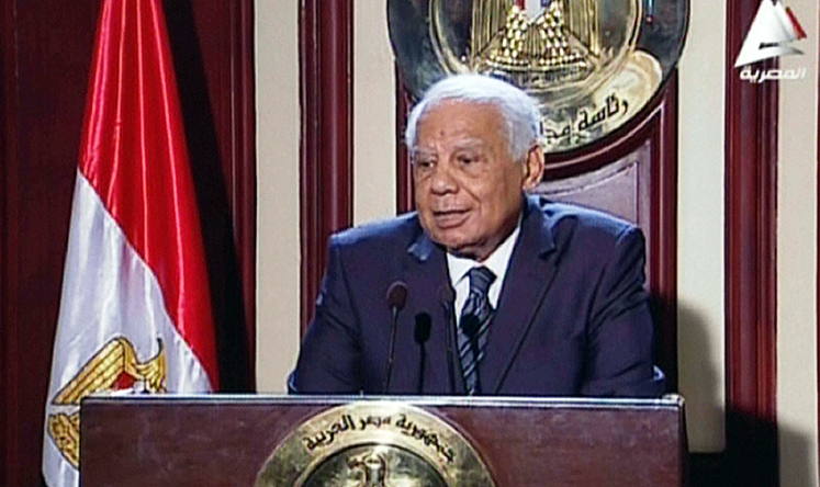 Egypt's Premier Hazem al-Beblawi addresses the media in Cairo. Photo: AFP