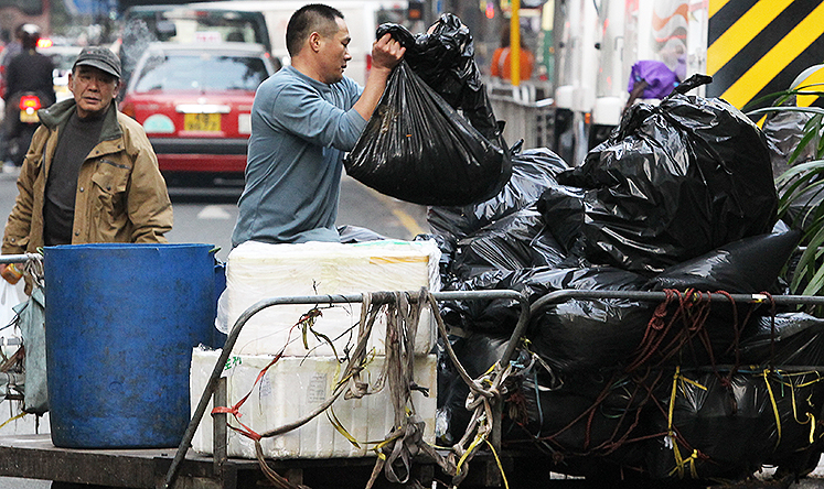 Garbage collection near Luard Road in Wan Chai. Photo: Edward Wong