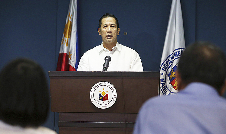 Philippine Foreign Affairs Department spokesman Raul Hernandez. The Philippines summoned China's envoy to protest what it says was the firing of a water cannon by a Chinese government vessel on Filipino fishermen in a disputed shoal in the South China Sea. Photo: AP
