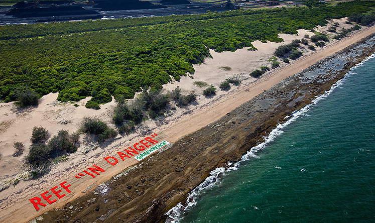  protest against the proposed coal port at Abbot Point, reading 'Reef In Danger', at the Great Barrier Reef in Queensland. Photo: EPA/Greenpeace