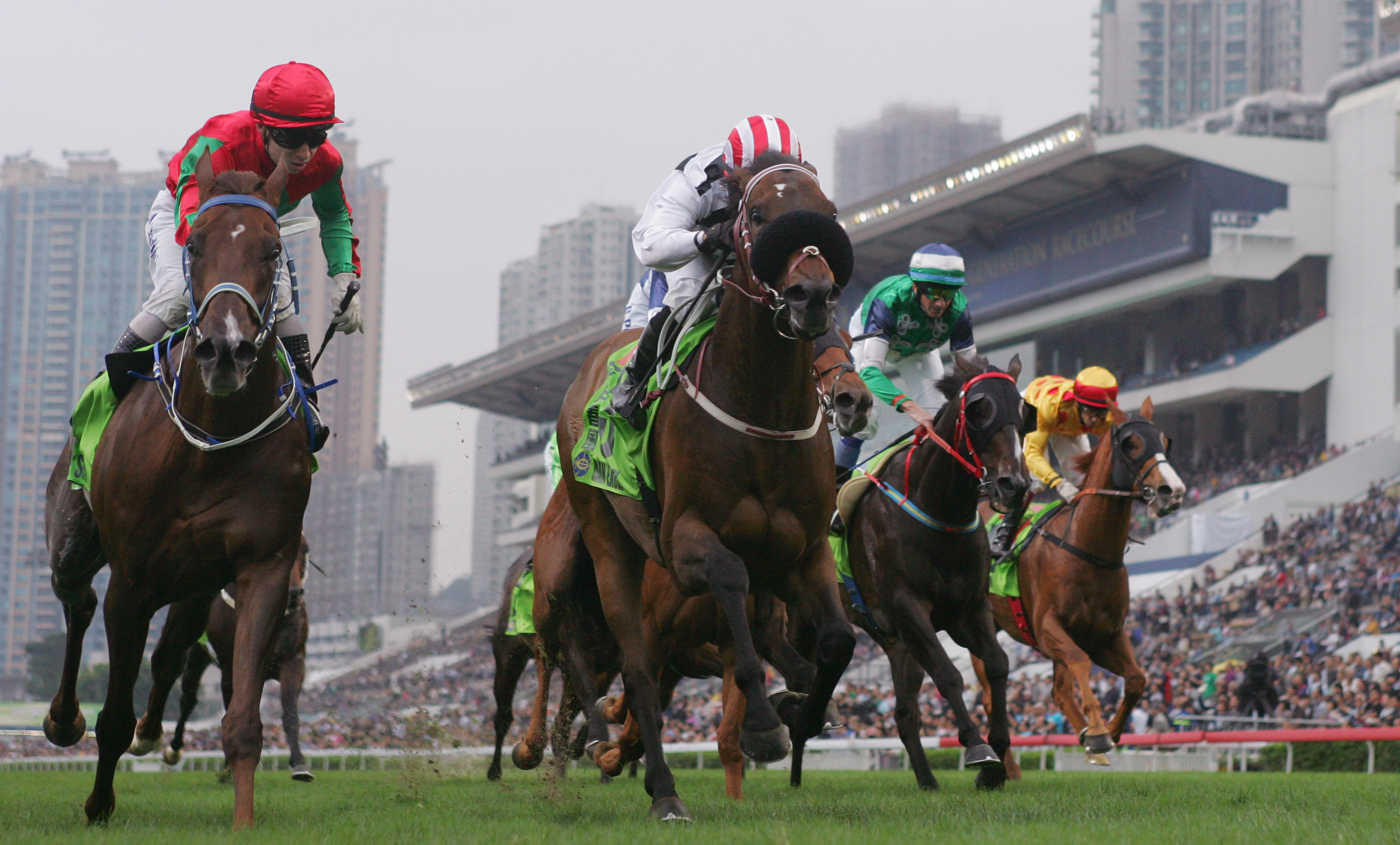 Dan Excel (Weichong Marwing) holds on to win last year's Champions Mile, in a race which only featured two international runners - English galloper Penitent and Kiwi veteran King Mufhasa. Photos: Kenneth Chan