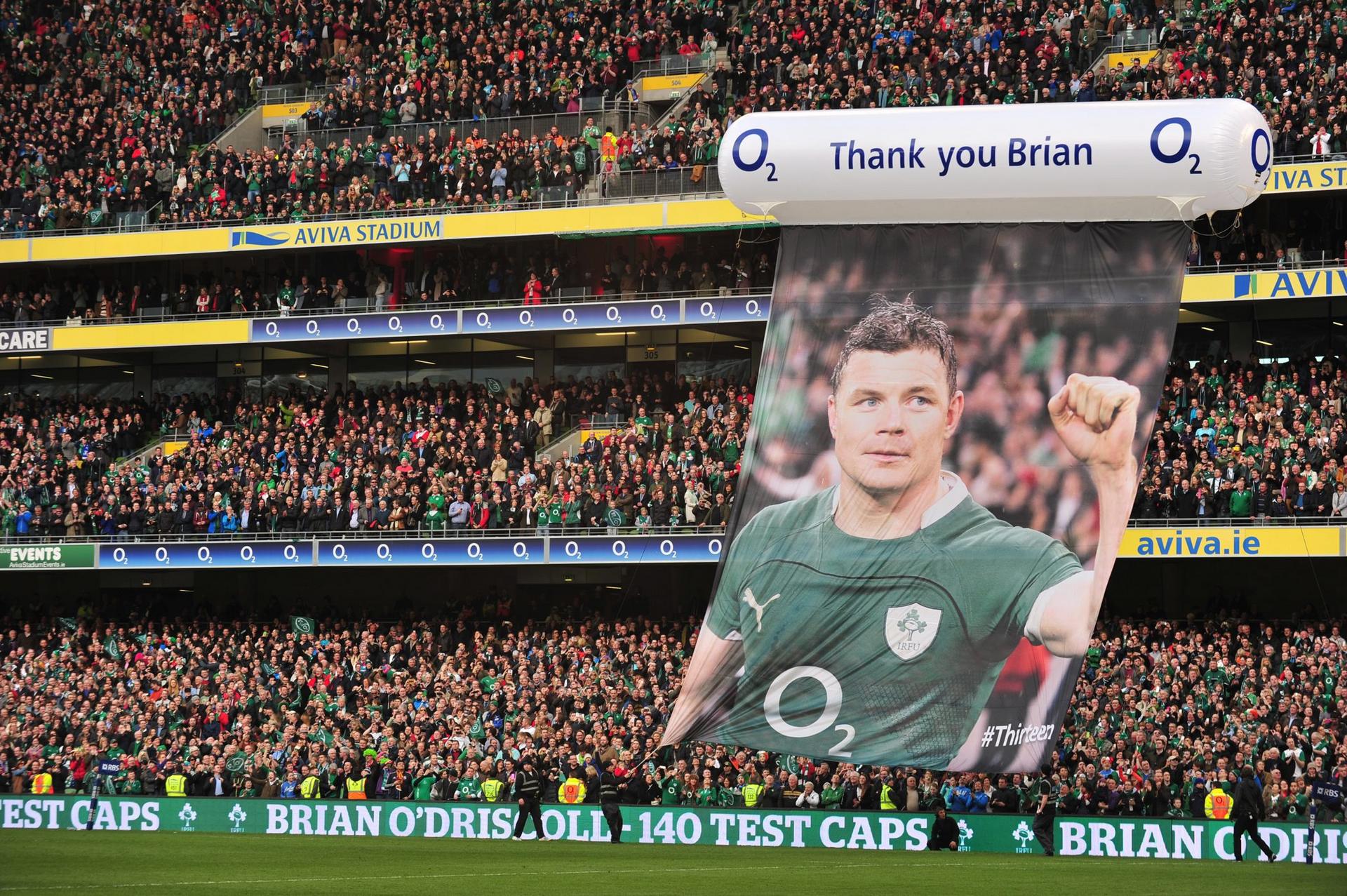 A banner acknowledges Irish rugby great Brian O’Driscoll during his emotional last home test on Saturday. Photo: EPA