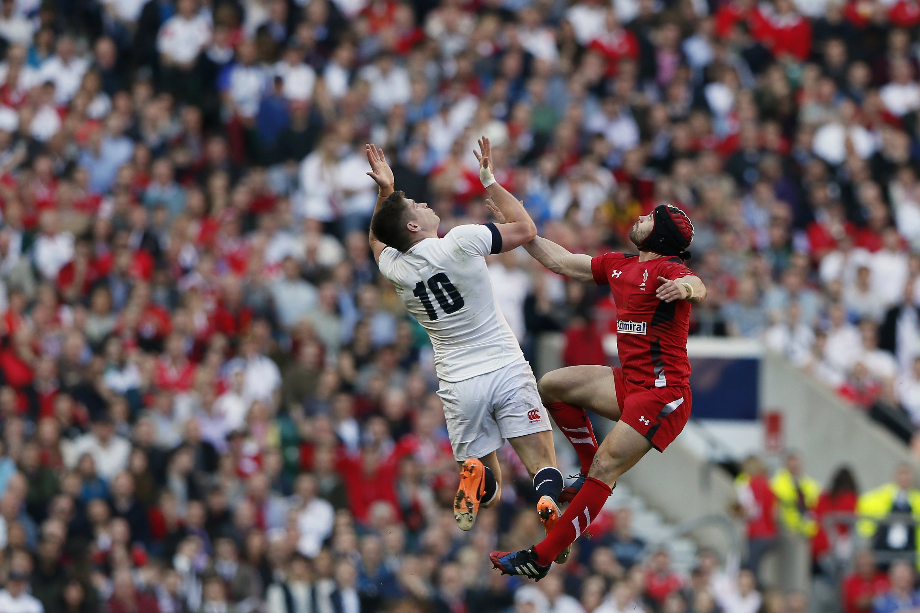 England’s Owen Farrell (left) challenges Leigh Halfpenny of Wales at Twickenham. Photo: Reuters