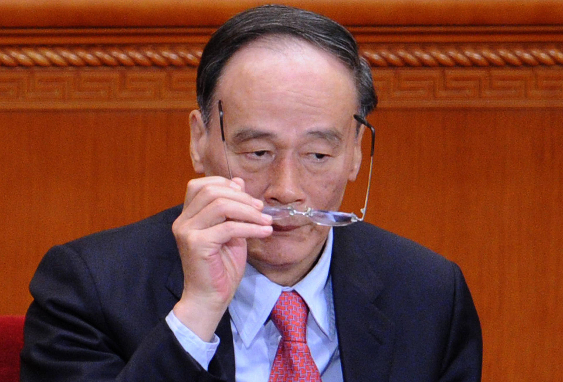 Anti-graft boss Wang Qishan, shown here on March 5, vowed "zero tolerance" for bad agents. Photo: AFP