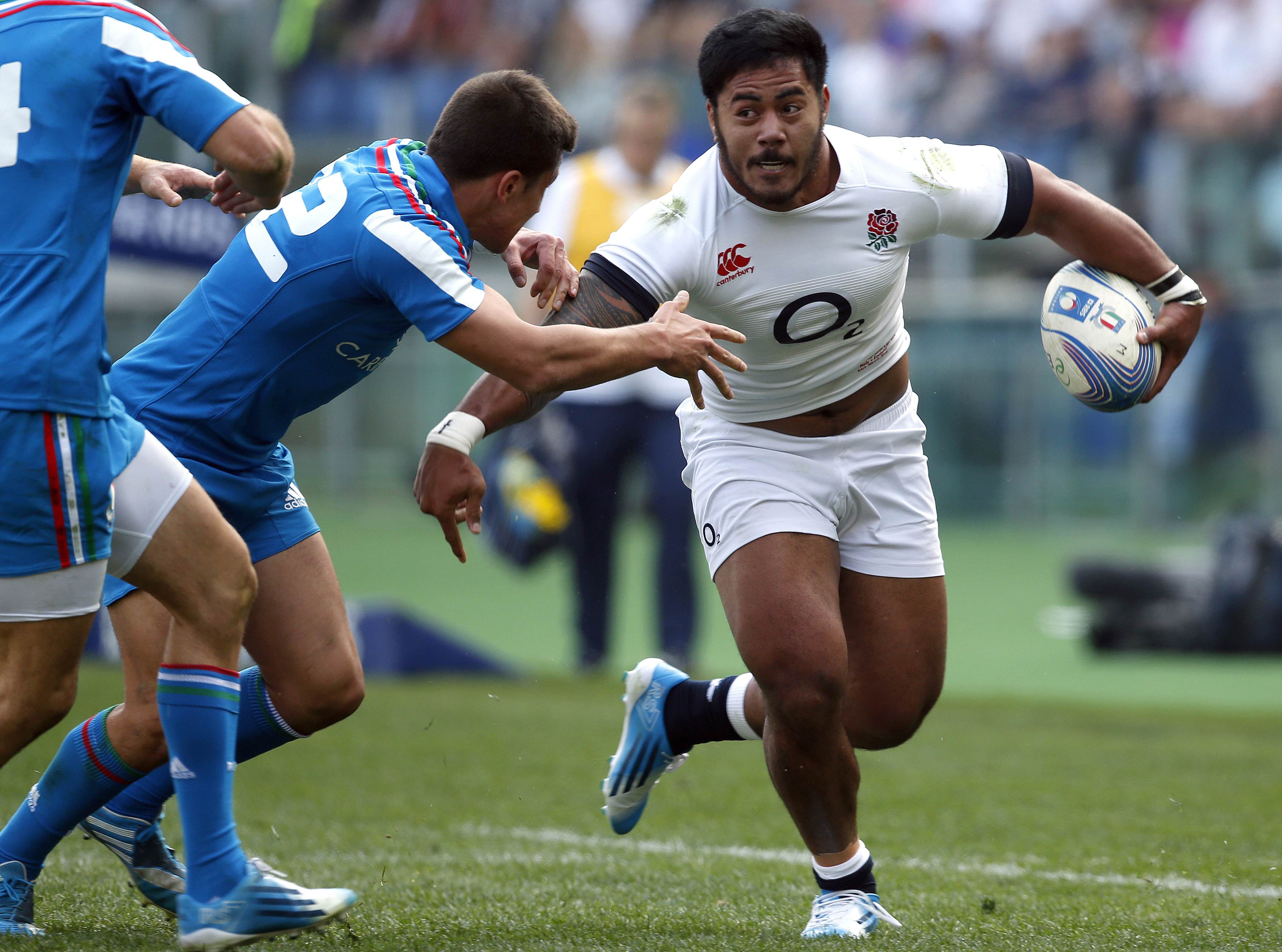 England's Manu Tuilagi on the charge against Italy in Rome. Photo: Reuters