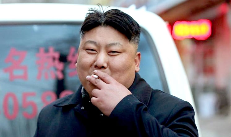 Shengyang's anonymous Kim-Jong-un-lookalike street vendor strikes a familiar pose.