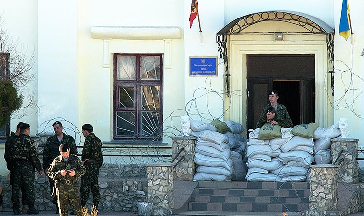 Ukrainian soldiers guard a naval base in the Crimea. Photo: AFP