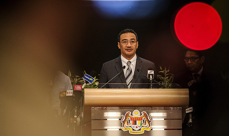 Malaysia's Transport and Defence Minister Hishammuddin Hussein speaks during a press briefing on Flight MH370. Photo: EPA