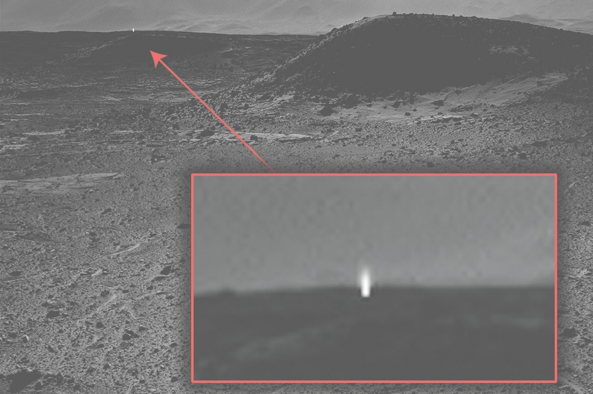 This photo taken by Nasa appears to show a beam of light coming from the surface of Mars