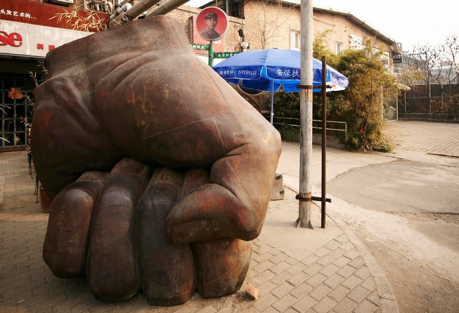 Liu Bolin's Iron Fist; a shop at 798 Art Zone. Photos: Zachary Bako 
