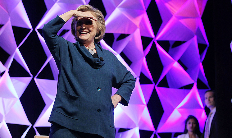 Former US secretary of state Hillary Clinton looks to the crowd after a woman threw a shoe toward her during a speech to the Institute of Scrap Recycling Industries in Las Vegas, Nevada on Thursday. Photo: AFP