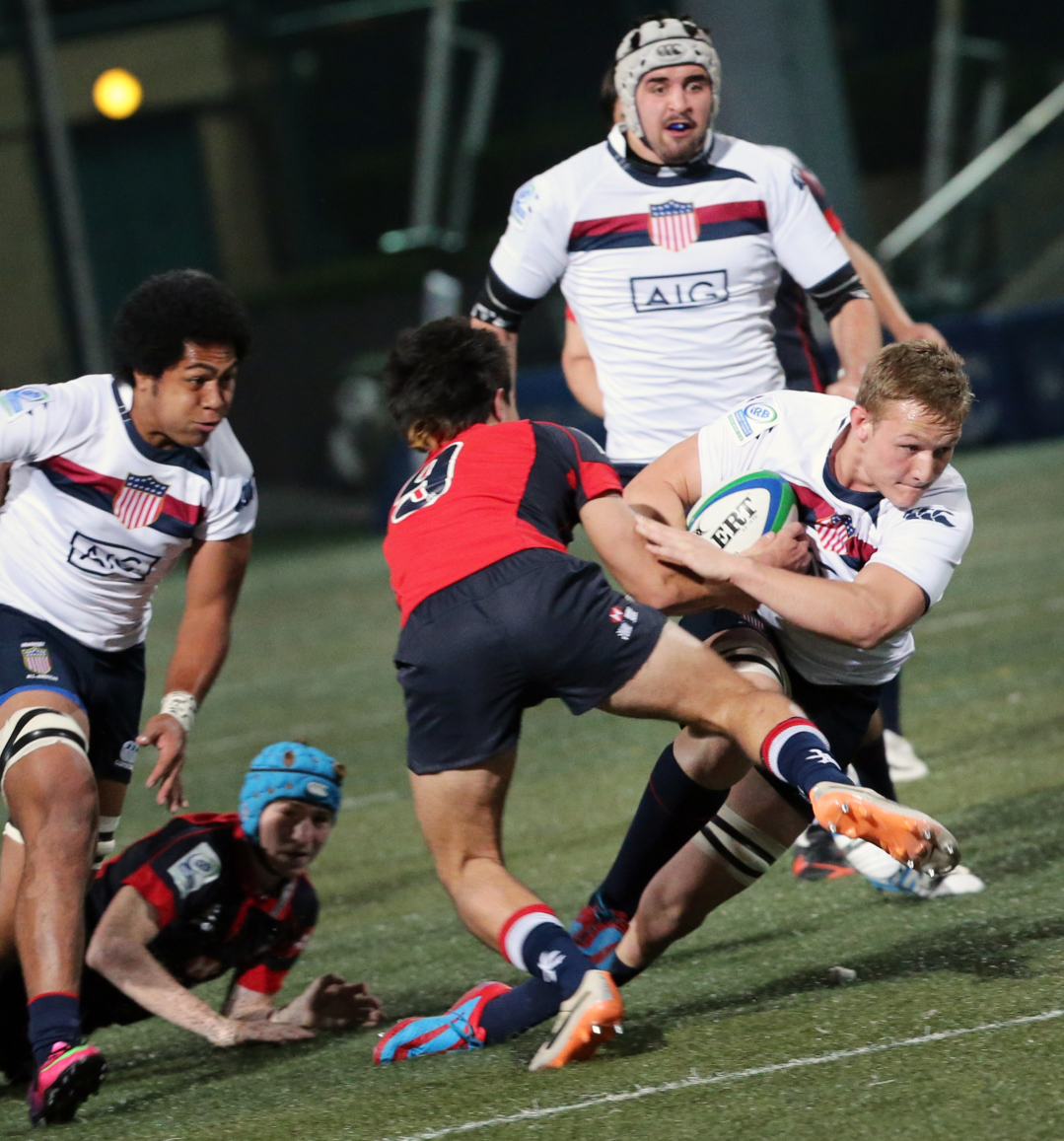 Hong Kong half-back James Christie puts his body on the line against the United States earlier in the IRB under-20s tournament. Photo: KY Cheng/SCMP