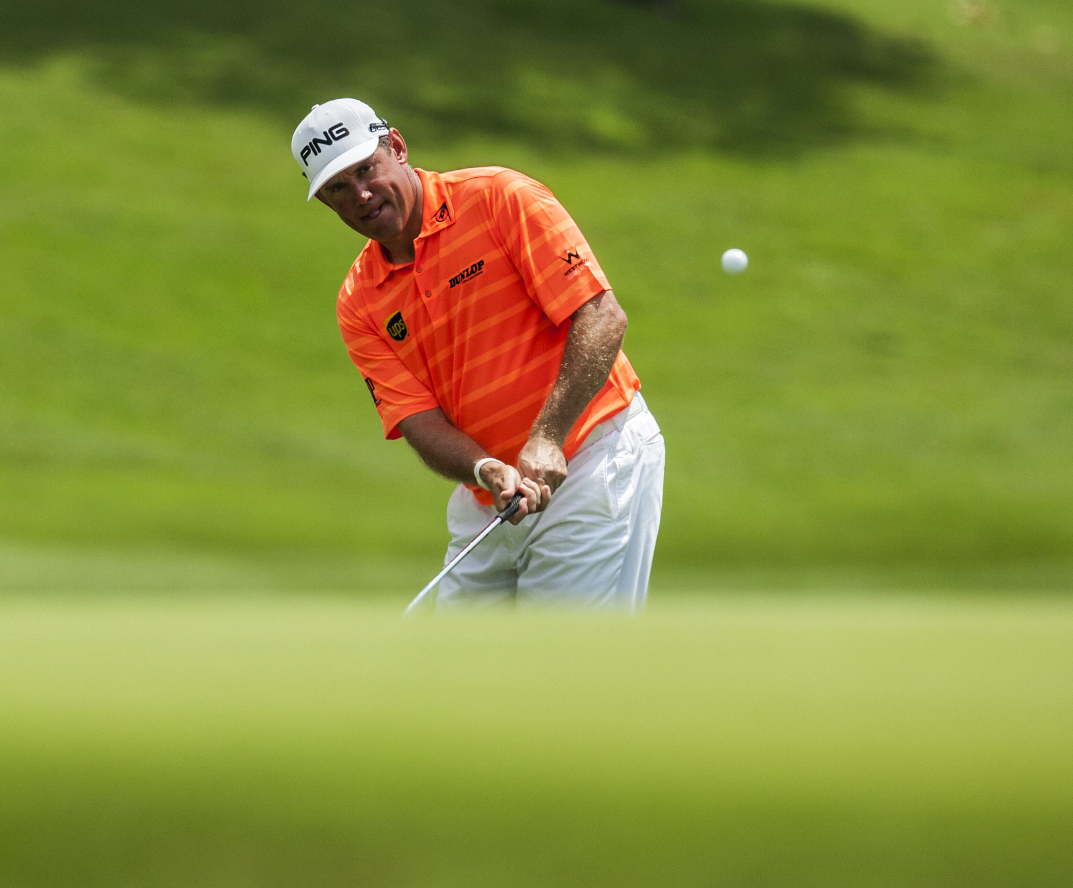 Lee Westwood of Englands plays a green-side shot during the third round of the Maybank Malaysian Open golf tournament in Kuala Lumpur. Photo: EPA