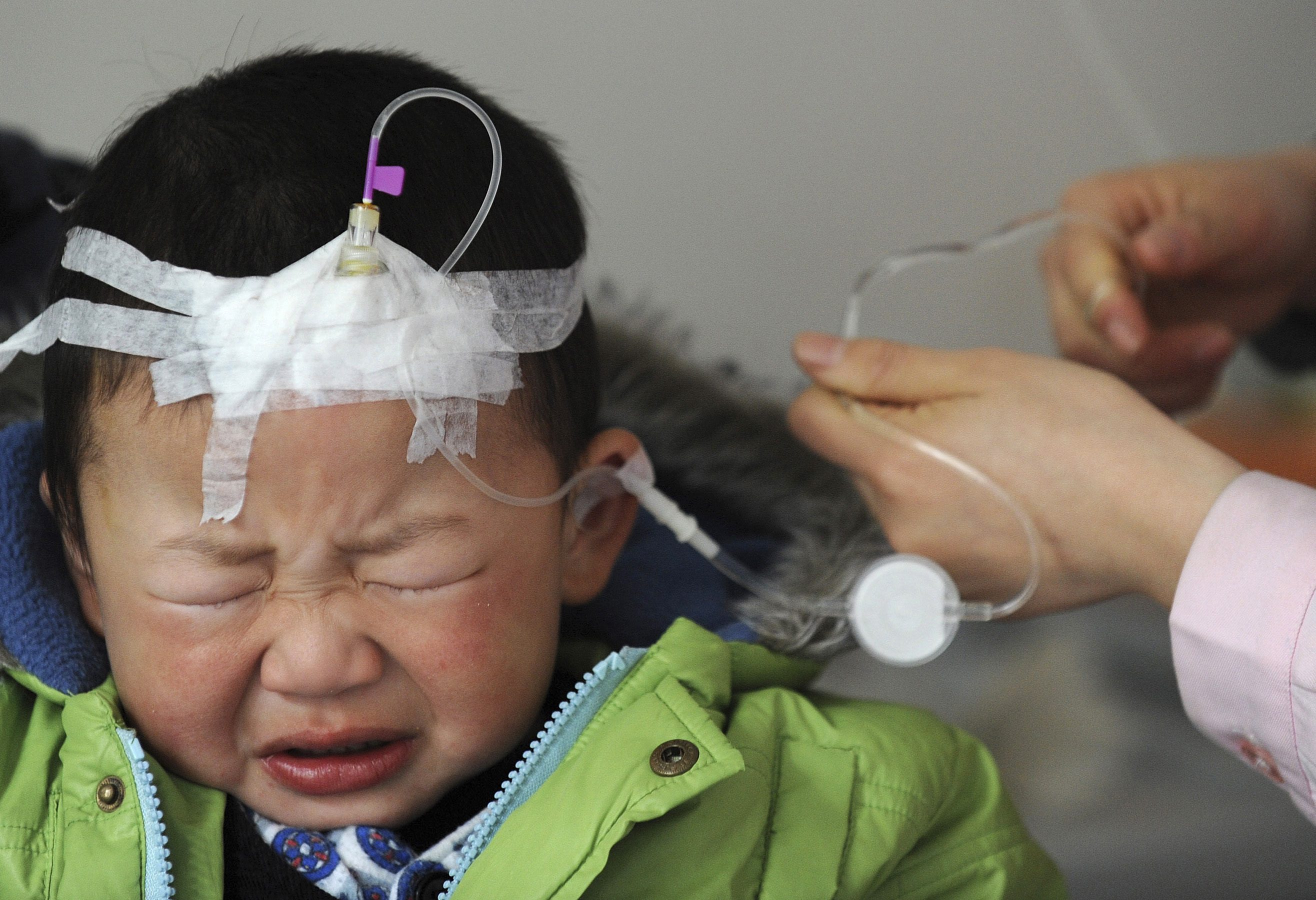 A mainland child gets treatment at hospital in Hefei, Anhui province. Recent data suggest parents are shunning vaccinations for their children after a hepatitis B scandal in December. Photo: Reuters