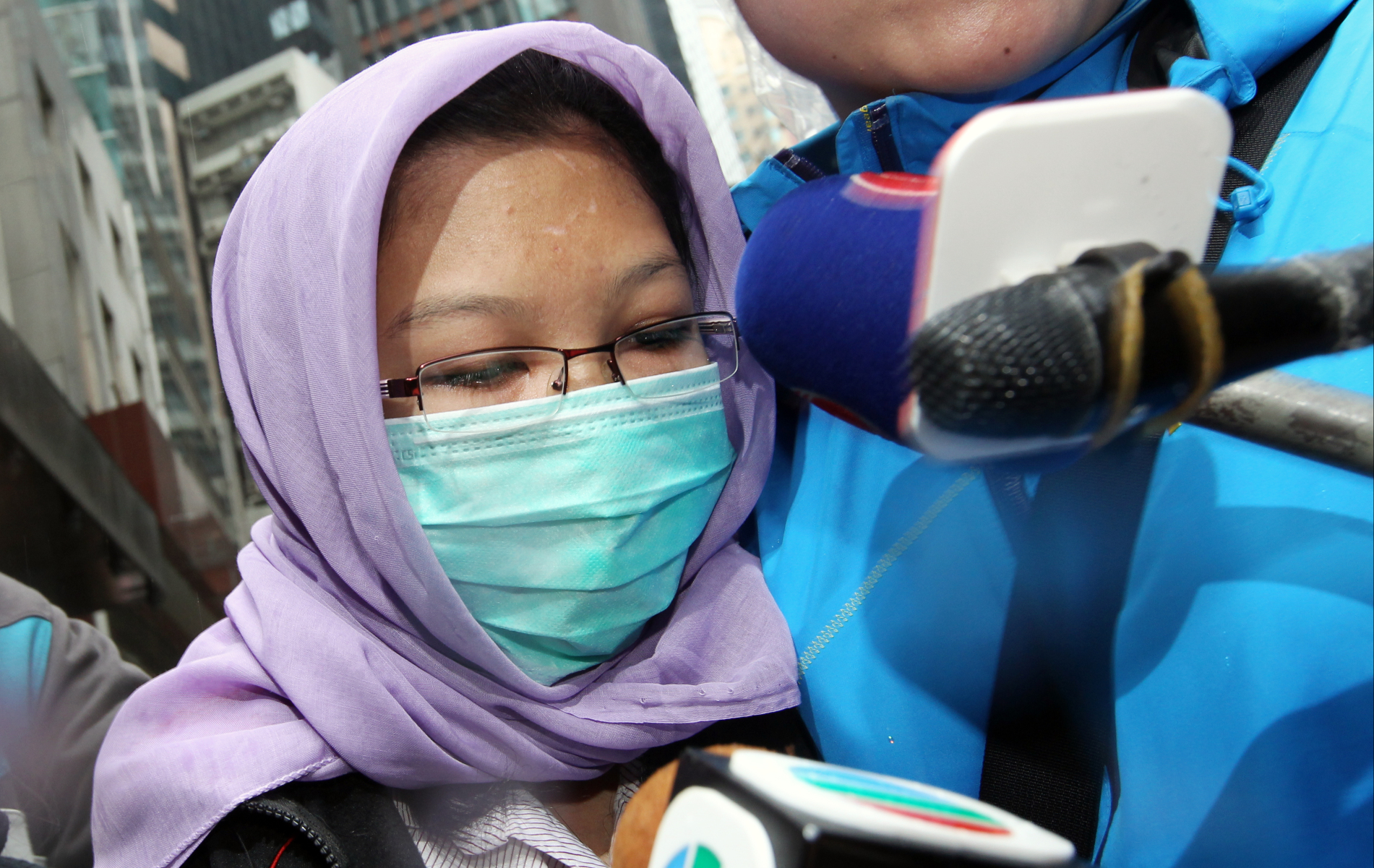 Erwiana, pictured when she was in Hong Kong to assist police, said she hoped governments around the world would give more attention to the conditions of migrant workers. Photo: Felix Wong