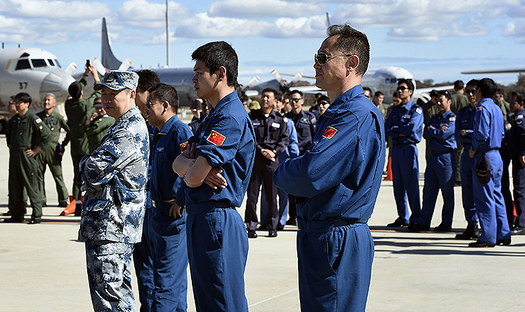 Air crew members from China involved in the search for missing Malaysia Airlines plane MH370 at the RAAF Pearce Base near Perth, Australia. Photo: Reuters
