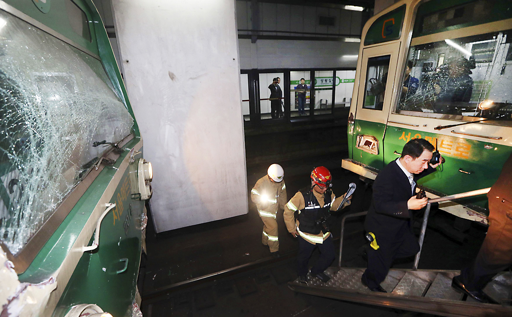 The two damaged subway trains at the point of collision. Photo: Reuters
