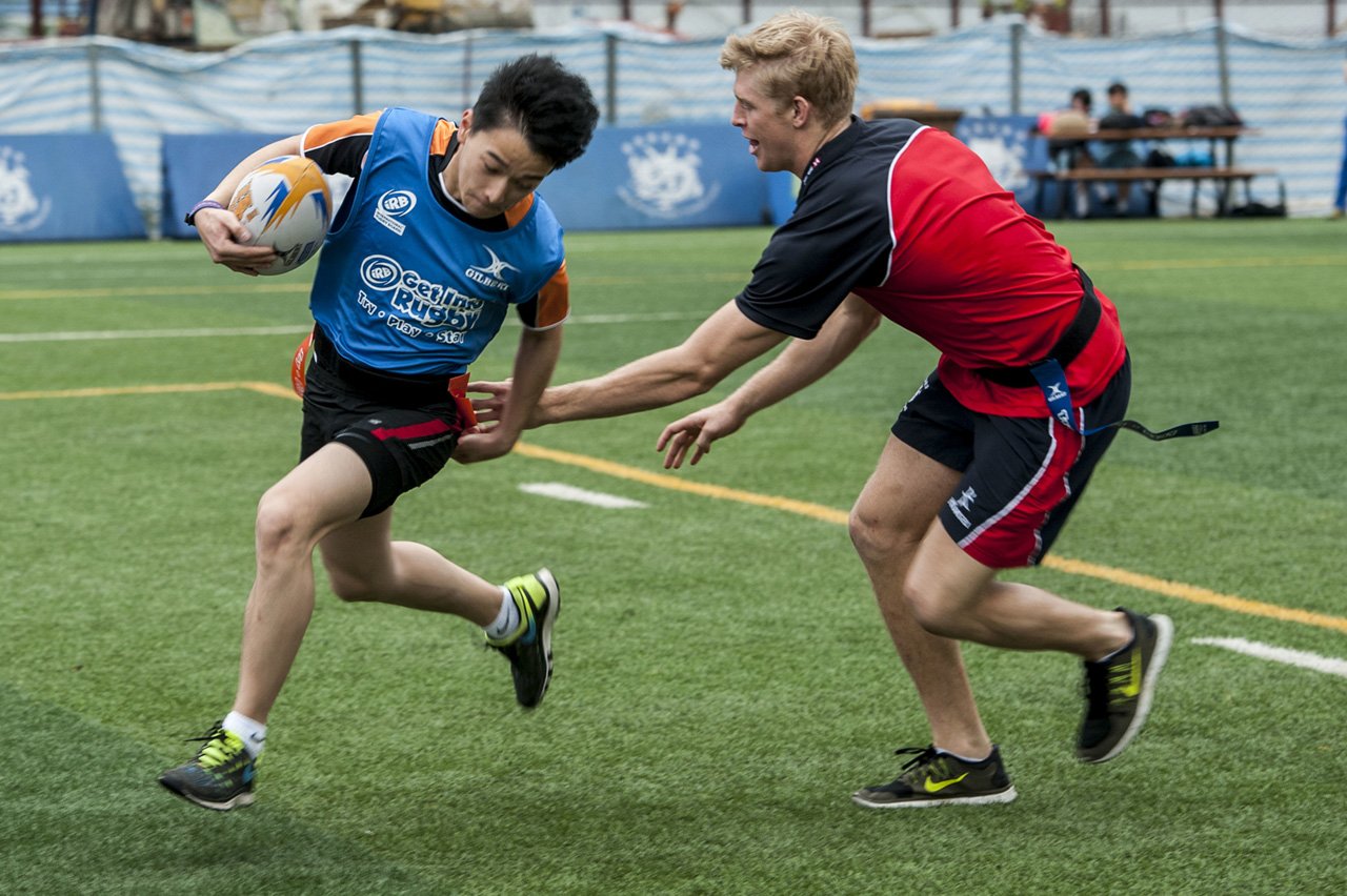 Players from several of the international teams competing in last month’s IRB Junior World Rugby Trophy held clinics for Hong Kong school children. Photo: HKRFU