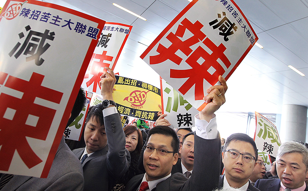 Property professionals protest against market cooling measures. Photo: Sam Tsang 