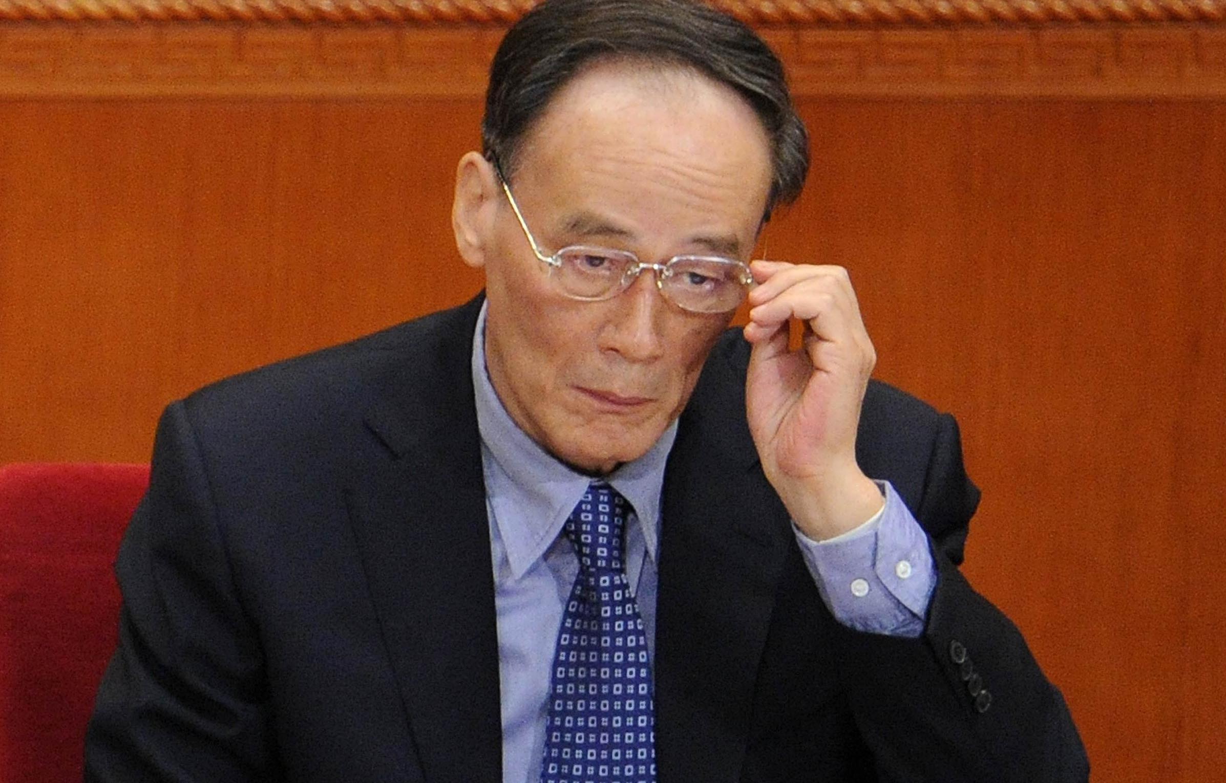 Wang Qishan reportedly met with the heads of state companies and government bureaus, urging them to step up their anti-graft efforts. Photo: AFP