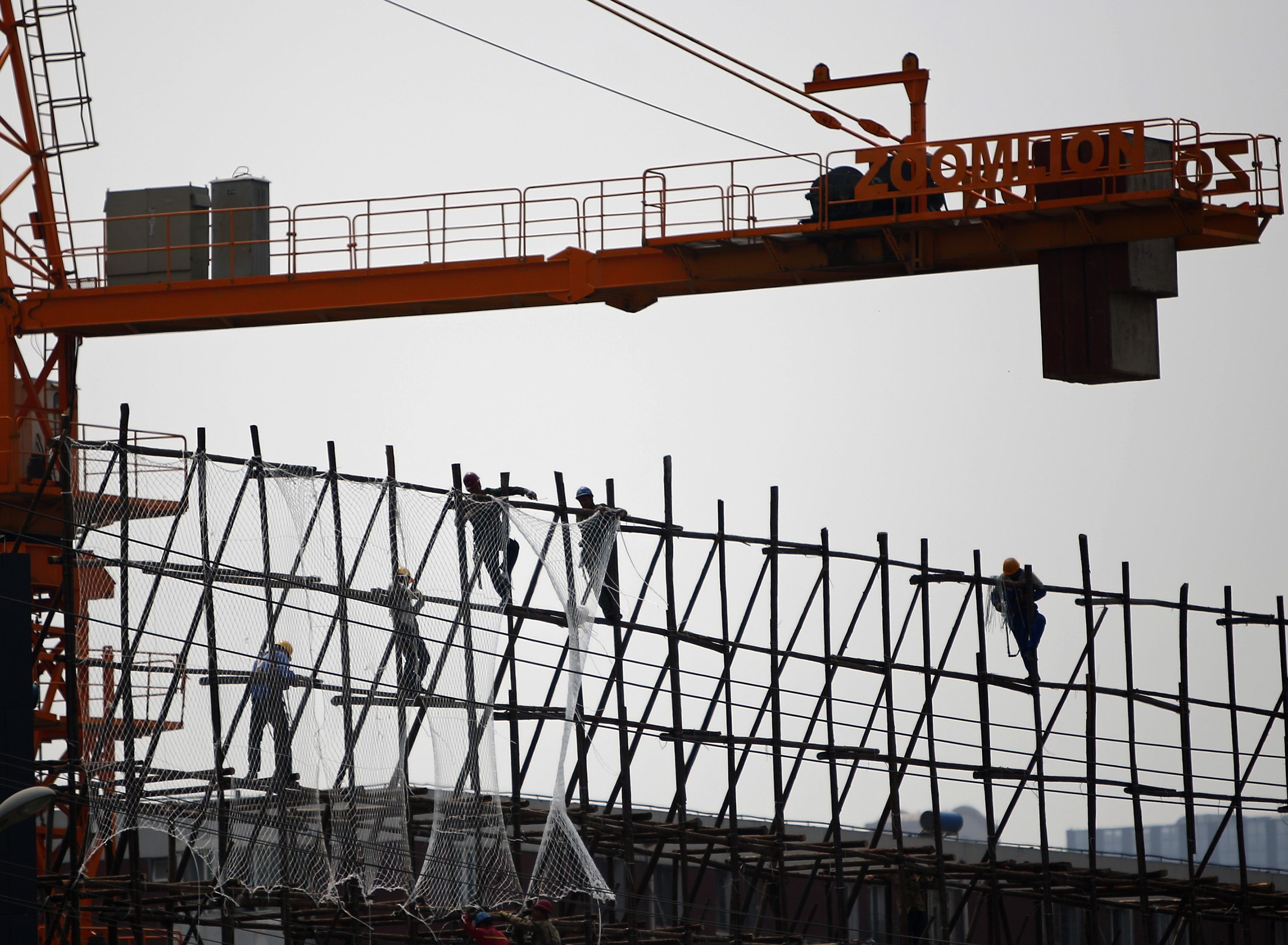A weak residential property market could affect construction and demand for land. Photo: Reuters