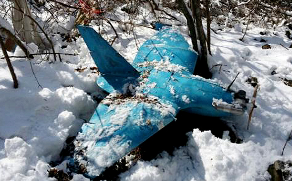 A crashed unmanned drone lies on a mountain in Samcheok, South Korea. Photo: AP