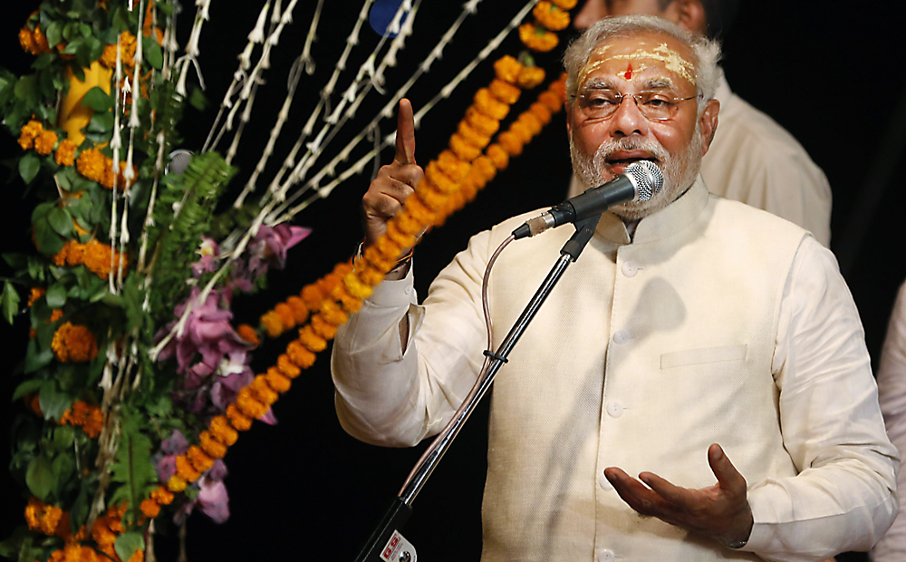 India's next prime minister Narendra Modi speaks after performing evening rituals on the banks of the River Ganges in Varanasi. Photo: AP