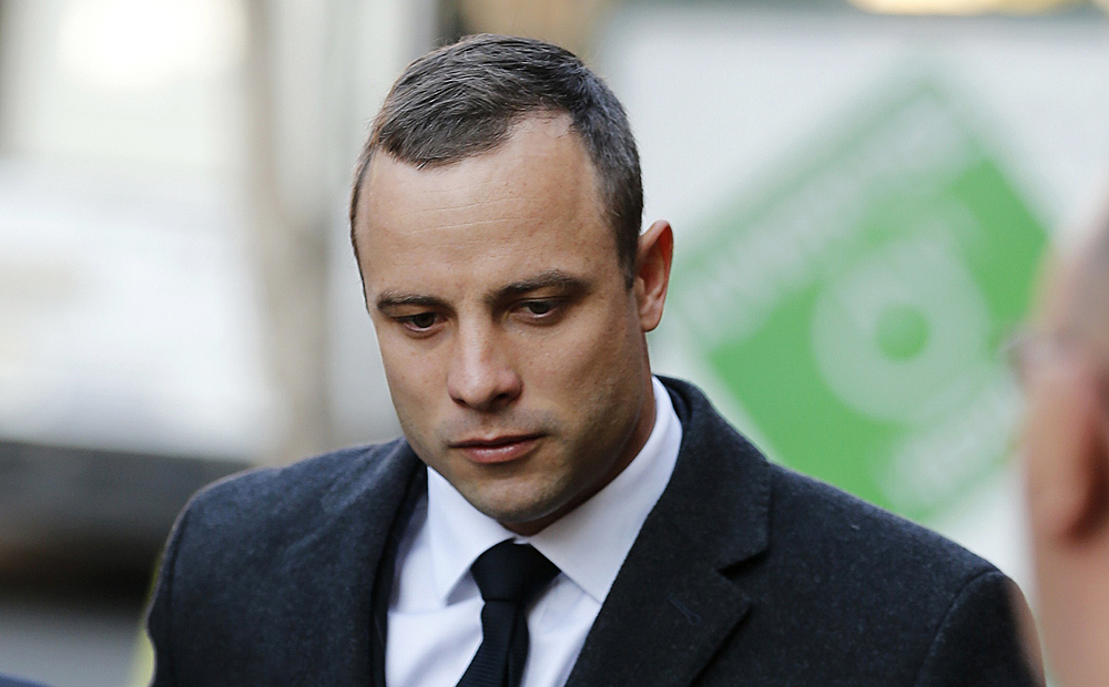 Olympic and Paralympic track star Oscar Pistorius arrives at the  High Court in Pretoria ahead of his trial for the murder of his girlfriend Reeva Steenkamp. Photo: Reuters