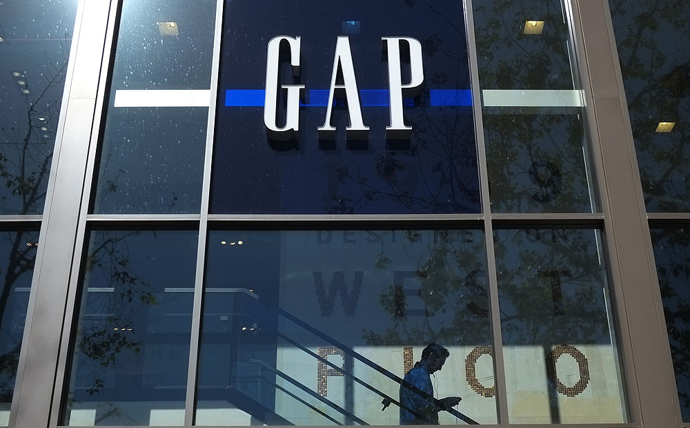 A shopper walks down the steps at a Gap store in Los Angeles. Photo: AP