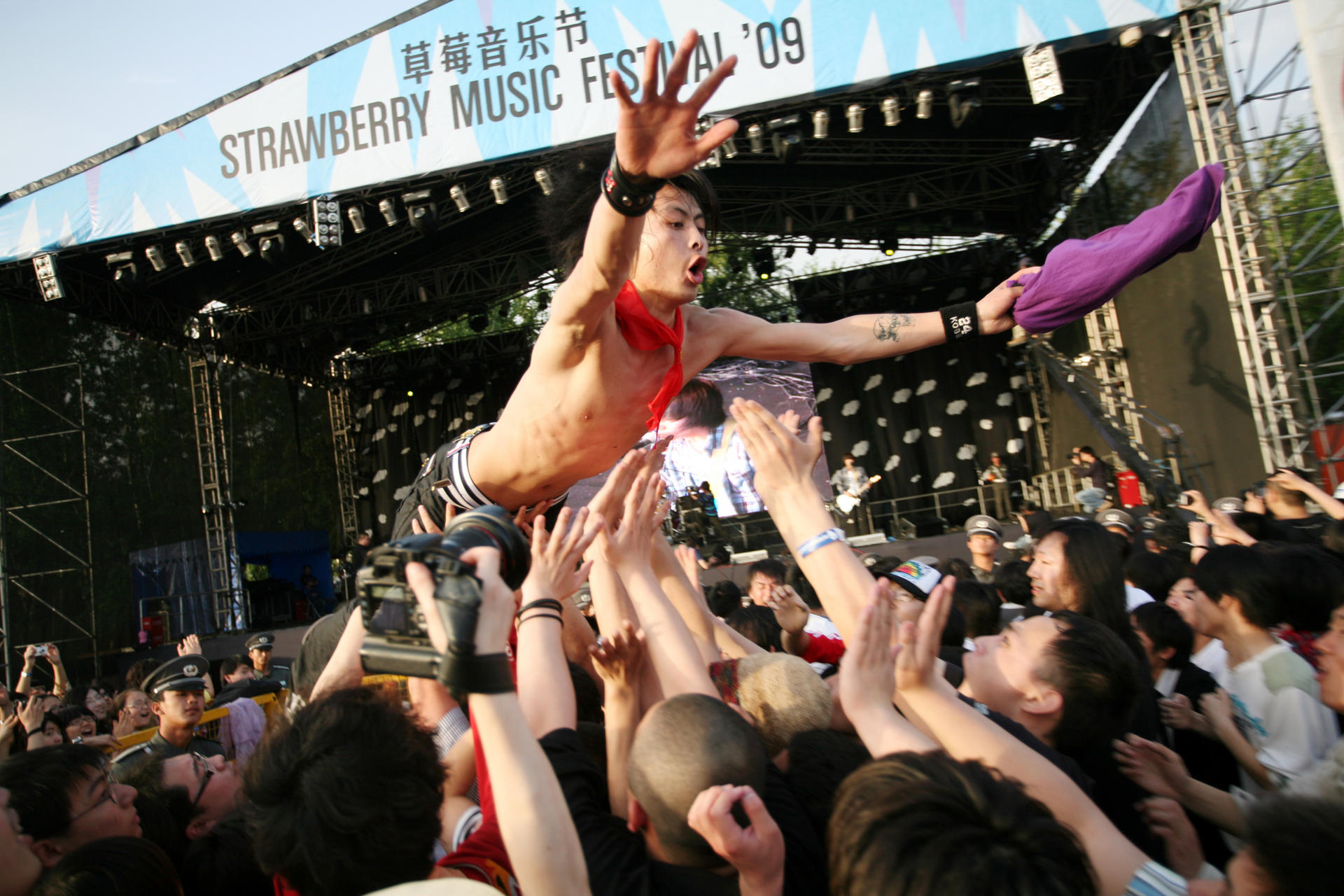 Don't stop me now: fans at the Strawberry Music Festival in Beijing. Photo: Corbis