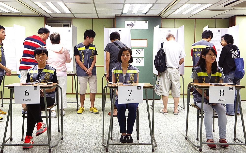 People vote in Hong Kong's unofficial referendum on democratic reform. Photo: AP